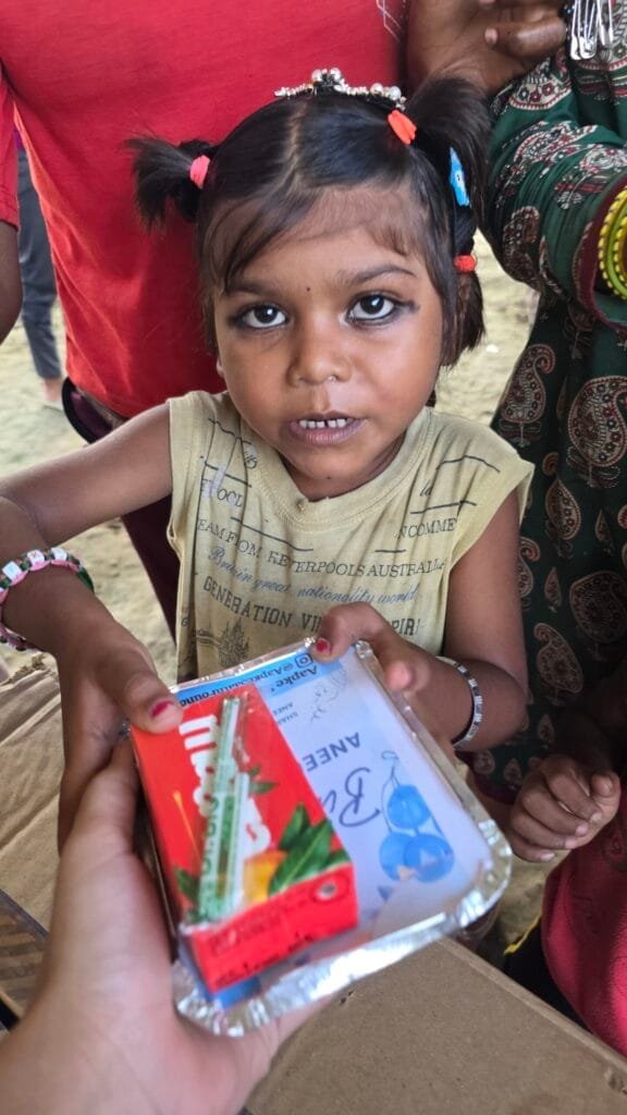 food donation to the poor child in the delhi slum on the occesion of birthday